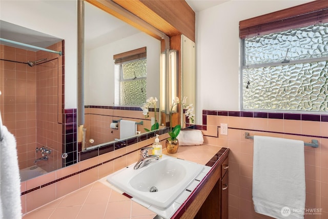 2842 NW 67th St, Seattle, WA 98117 - bathroom with tile walls, vanity, shower / tub combination, and wainscoting
