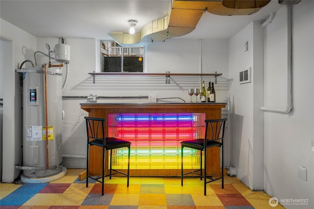 2842 NW 67th St, Seattle, WA 98117 - bar area with electric water heater and tile patterned floors