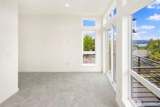 1244 15th Ave E Unit 9, Seattle, WA 98112 - unfurnished room featuring carpet floors and recessed lighting