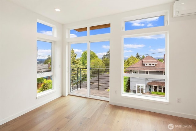 1244 15th Ave E Unit 9, Seattle, WA 98112 - unfurnished sunroom featuring an AC wall unit