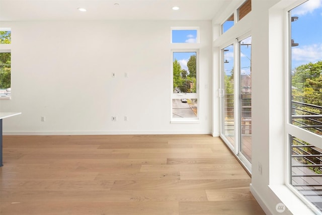 1244 15th Ave E Unit 9, Seattle, WA 98112 - spare room with light wood-type flooring and recessed lighting