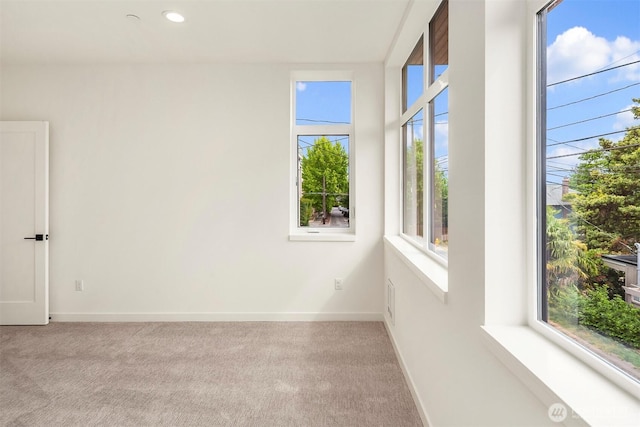1244 15th Ave E Unit 9, Seattle, WA 98112 - unfurnished room featuring carpet flooring and recessed lighting