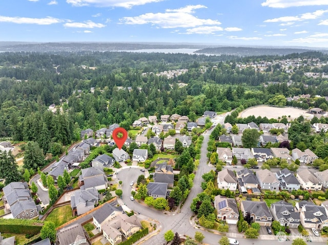 8829 138th Ct SE, Newcastle, WA 98059 - aerial perspective of suburban area featuring a forest