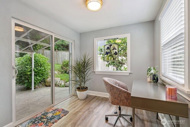 4431 SW Kenyon Pl, Seattle, WA 98136 - office area with healthy amount of natural light and wood finished floors