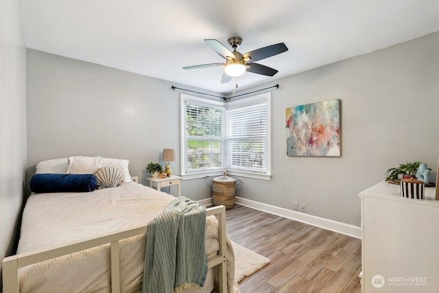 4431 SW Kenyon Pl, Seattle, WA 98136 - bedroom with light wood-style floors and a ceiling fan