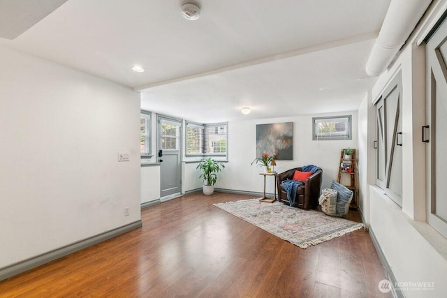 4431 SW Kenyon Pl, Seattle, WA 98136 - sitting room with wood finished floors and recessed lighting