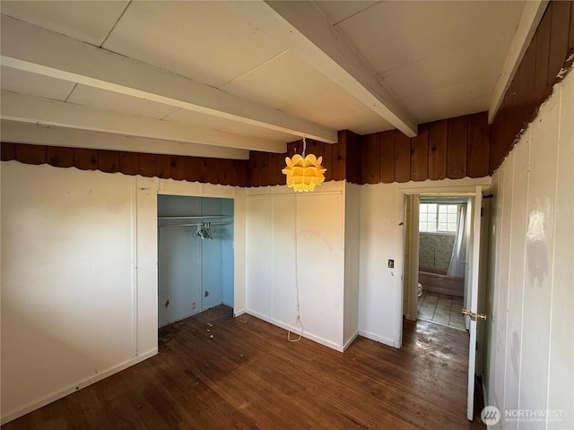 1309 29th St, Anacortes, WA 98221 - unfurnished dining area with beam ceiling and wood finished floors