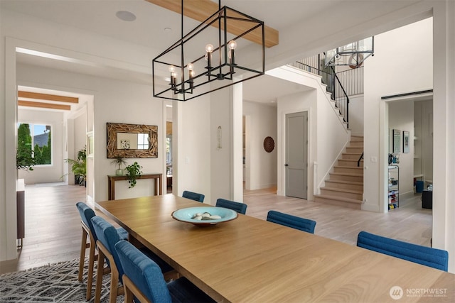 4405 88th Ave SE, Mercer Island, WA 98040 - dining area with a chandelier, stairs, and wood finished floors