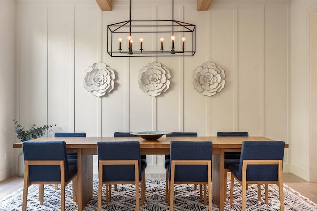 4405 88th Ave SE, Mercer Island, WA 98040 - dining space with a decorative wall, a chandelier, and wood finished floors