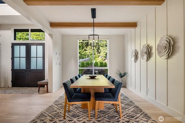 4405 88th Ave SE, Mercer Island, WA 98040 - dining room featuring beamed ceiling, light wood-style floors, and french doors