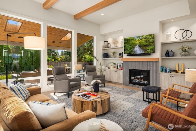 4405 88th Ave SE, Mercer Island, WA 98040 - living room with a fireplace, beam ceiling, wood finished floors, and built in features