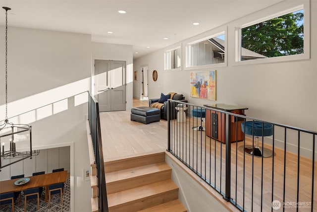 4405 88th Ave SE, Mercer Island, WA 98040 - stairway featuring wood finished floors, a chandelier, and recessed lighting