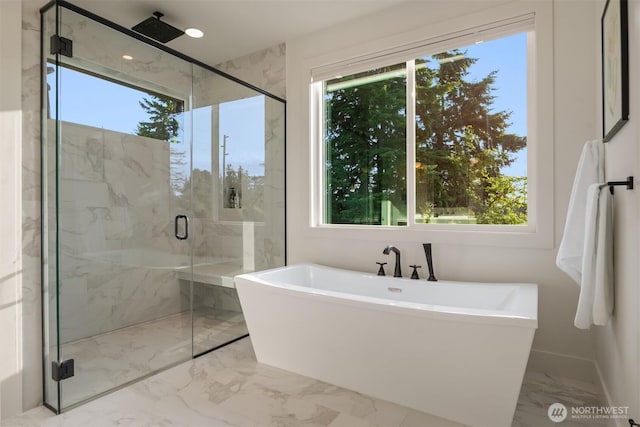 4405 88th Ave SE, Mercer Island, WA 98040 - full bath featuring marble tiled floors, healthy amount of natural light, a soaking tub, and a marble finish shower