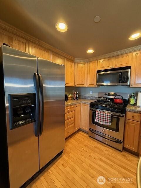 2103 Tacoma Ct, Tacoma, WA 98405 - kitchen with appliances with stainless steel finishes, light wood-type flooring, and recessed lighting