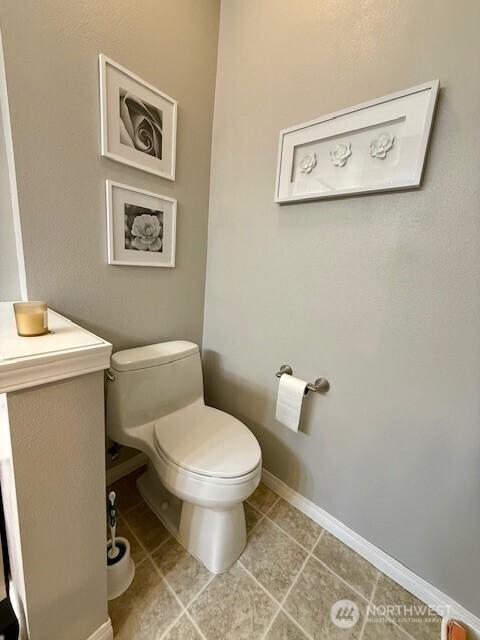 2103 Tacoma Ct, Tacoma, WA 98405 - bathroom with toilet and tile patterned floors