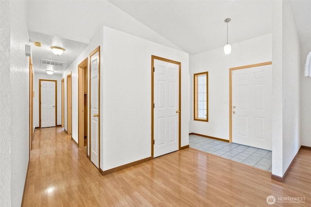 7609 39th Ct SE, Lacey, WA 98503 - foyer featuring light wood finished floors and vaulted ceiling