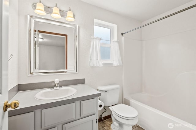 7609 39th Ct SE, Lacey, WA 98503 - bathroom featuring vanity, washtub / shower combination, and tile patterned floors