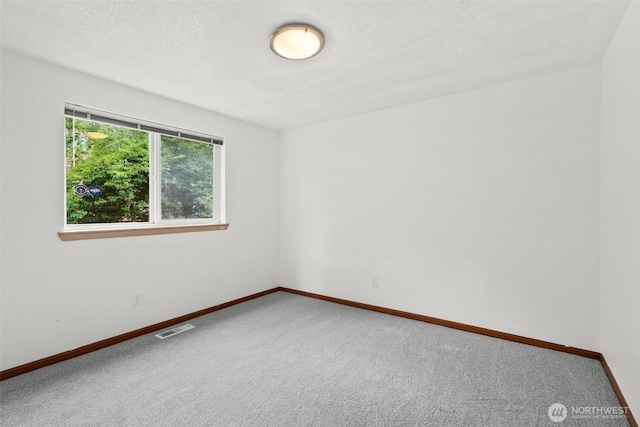 7609 39th Ct SE, Lacey, WA 98503 - carpeted empty room featuring baseboards
