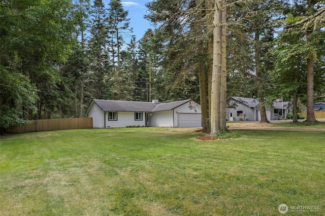 2253 Wellman Pl, Oak Harbor, WA 98277 - view of front of house featuring an attached garage and a chimney