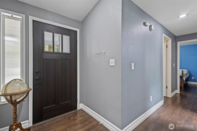 2253 Wellman Pl, Oak Harbor, WA 98277 - entryway with dark wood-type flooring and a textured wall