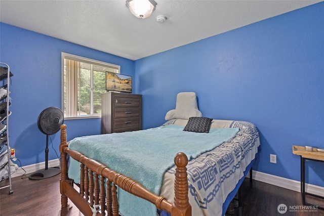 2253 Wellman Pl, Oak Harbor, WA 98277 - bedroom featuring baseboards and wood finished floors
