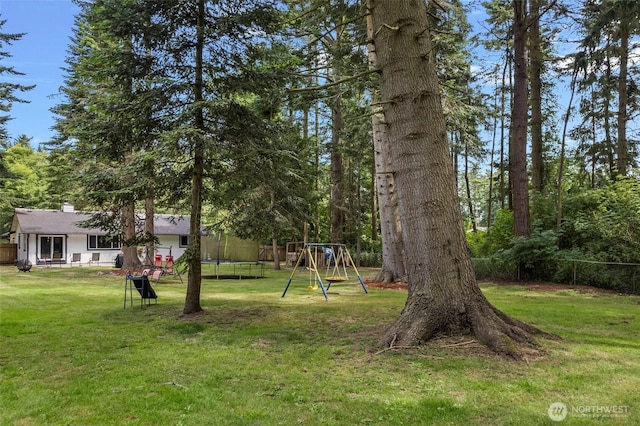 2253 Wellman Pl, Oak Harbor, WA 98277 - view of yard with a playground and a trampoline