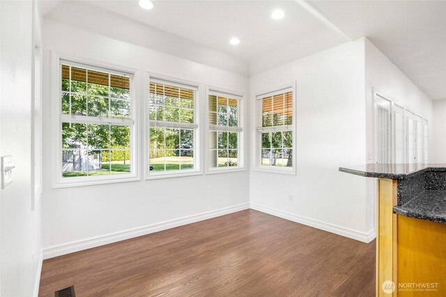 5476 Lorri Ln, Moses Lake, WA 98837 - unfurnished dining area with dark wood finished floors, healthy amount of natural light, and recessed lighting