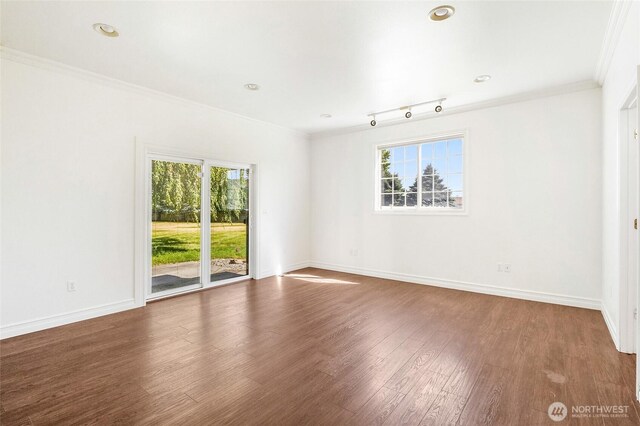 5476 Lorri Ln, Moses Lake, WA 98837 - unfurnished room with plenty of natural light, ornamental molding, wood finished floors, and recessed lighting