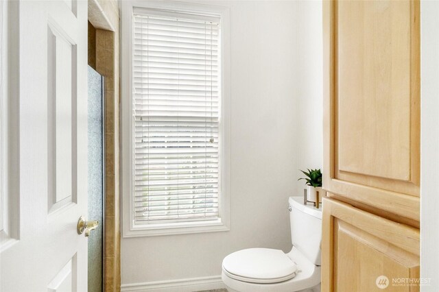 5476 Lorri Ln, Moses Lake, WA 98837 - bathroom with toilet and an enclosed shower