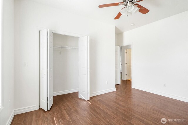5476 Lorri Ln, Moses Lake, WA 98837 - unfurnished bedroom featuring wood finished floors, a closet, and a ceiling fan