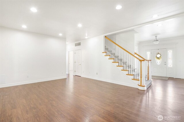 5476 Lorri Ln, Moses Lake, WA 98837 - unfurnished living room with stairway, wood finished floors, and recessed lighting
