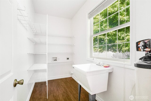 5476 Lorri Ln, Moses Lake, WA 98837 - laundry room featuring washer hookup and dark wood finished floors