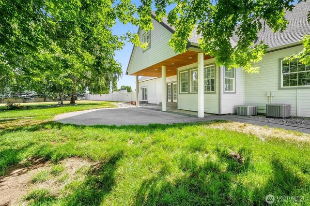 5476 Lorri Ln, Moses Lake, WA 98837 - back of house featuring a patio