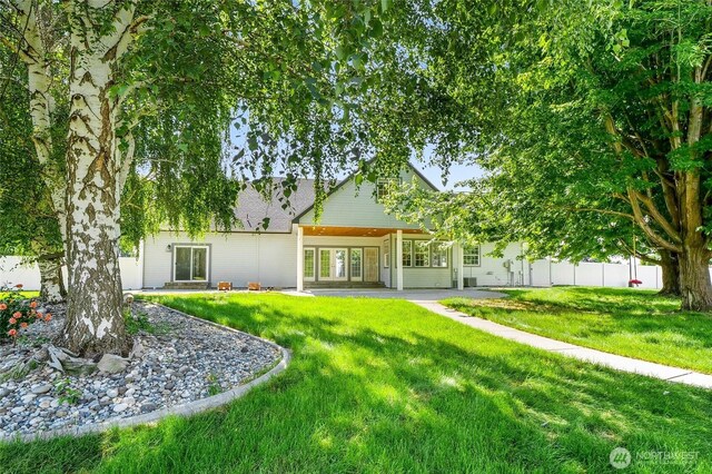 5476 Lorri Ln, Moses Lake, WA 98837 - rear view of house with a patio area
