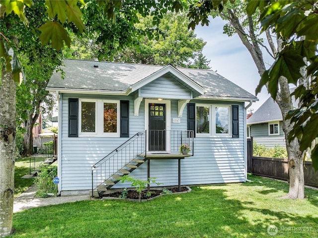 8047 Earl Ave NW, Seattle, WA 98117 - bungalow-style house with roof with shingles