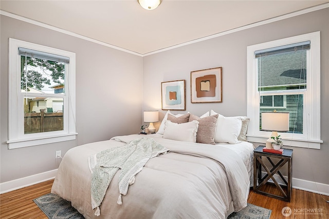 8047 Earl Ave NW, Seattle, WA 98117 - bedroom with ornamental molding and wood finished floors