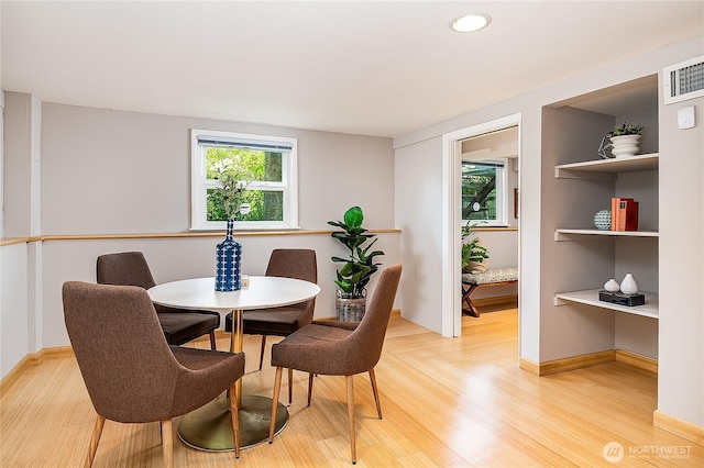 8047 Earl Ave NW, Seattle, WA 98117 - dining area featuring light wood-type flooring and recessed lighting