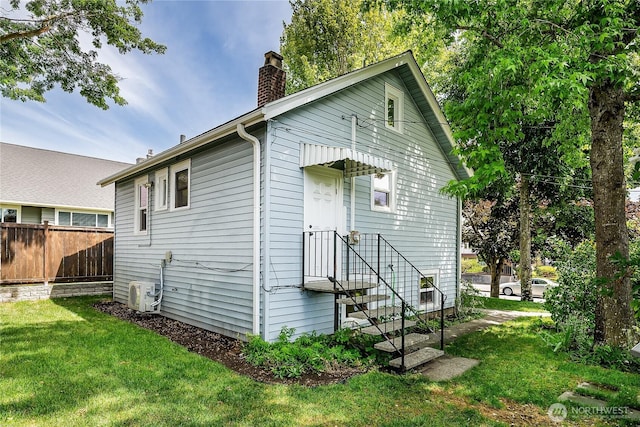 8047 Earl Ave NW, Seattle, WA 98117 - view of property exterior featuring a chimney and a cooling unit