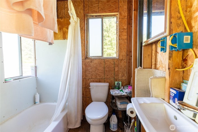 1884 Dowans Creek Rd, Forks, WA 98331 - bathroom featuring plenty of natural light and shower / tub combo with curtain