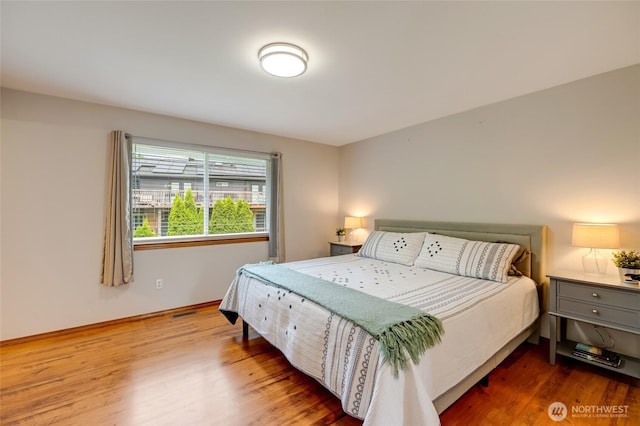 632 97th Ave SE, Lake Stevens, WA 98258 - bedroom with wood finished floors and baseboards