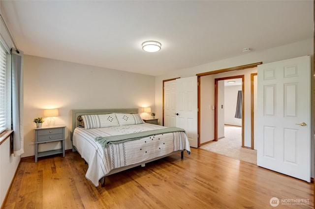 632 97th Ave SE, Lake Stevens, WA 98258 - bedroom with light wood-type flooring and baseboards