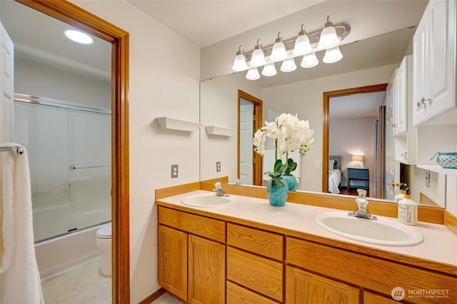 632 97th Ave SE, Lake Stevens, WA 98258 - ensuite bathroom with double vanity and enclosed tub / shower combo