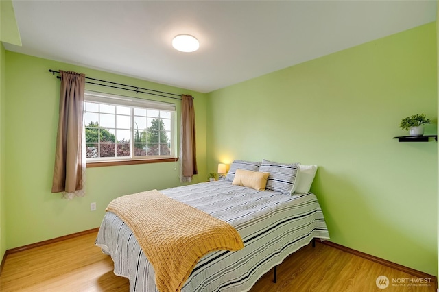 632 97th Ave SE, Lake Stevens, WA 98258 - bedroom featuring wood finished floors and baseboards