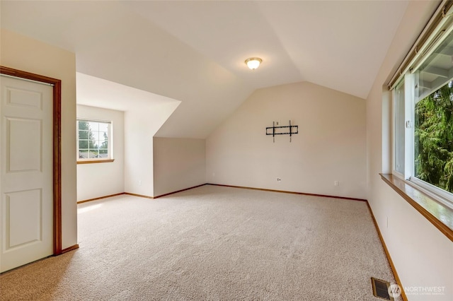 632 97th Ave SE, Lake Stevens, WA 98258 - bonus room featuring light colored carpet and vaulted ceiling