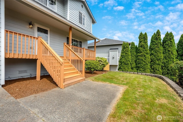 632 97th Ave SE, Lake Stevens, WA 98258 - view of home's exterior featuring a lawn, stairs, and covered porch