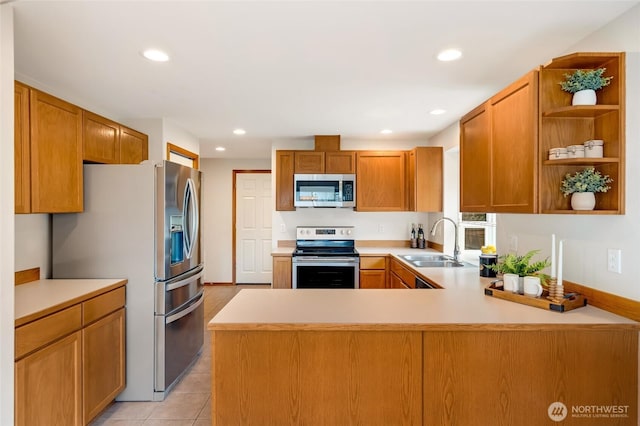 632 97th Ave SE, Lake Stevens, WA 98258 - kitchen featuring stainless steel appliances, light countertops, open shelves, recessed lighting, and a peninsula