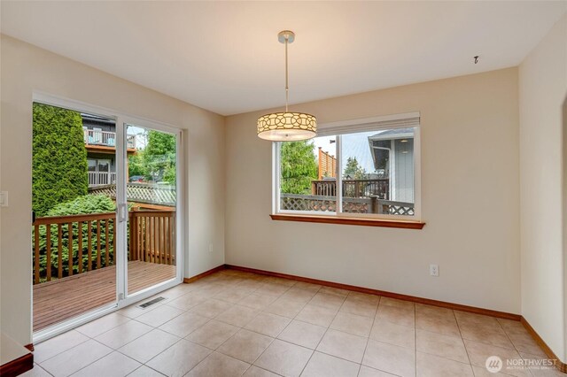 632 97th Ave SE, Lake Stevens, WA 98258 - empty room with baseboards and light tile patterned flooring