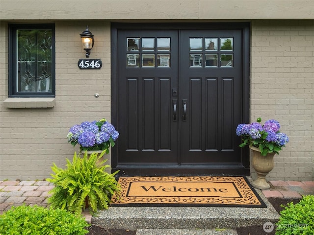 4546 193rd Pl SE, Issaquah, WA 98027 - entrance to property with french doors and brick siding