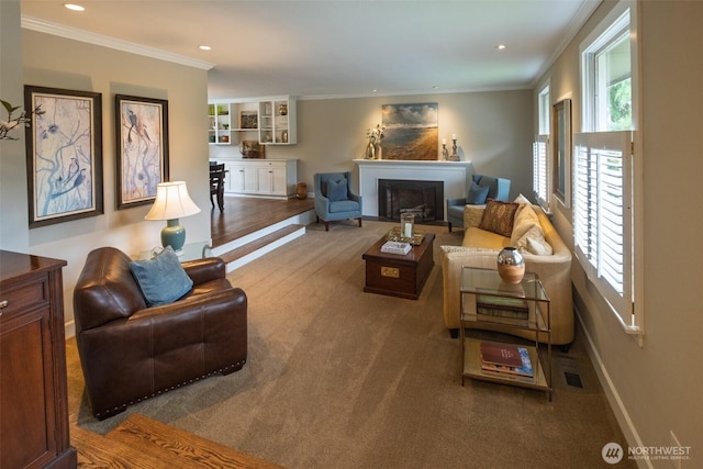 4546 193rd Pl SE, Issaquah, WA 98027 - living area featuring crown molding, carpet flooring, a fireplace, and recessed lighting