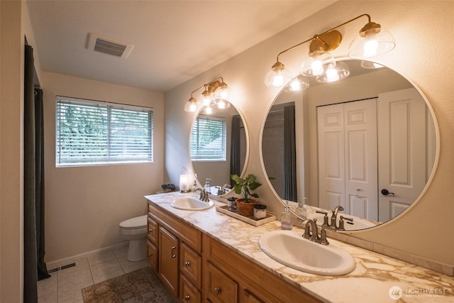 4546 193rd Pl SE, Issaquah, WA 98027 - bathroom featuring double vanity and tile patterned flooring